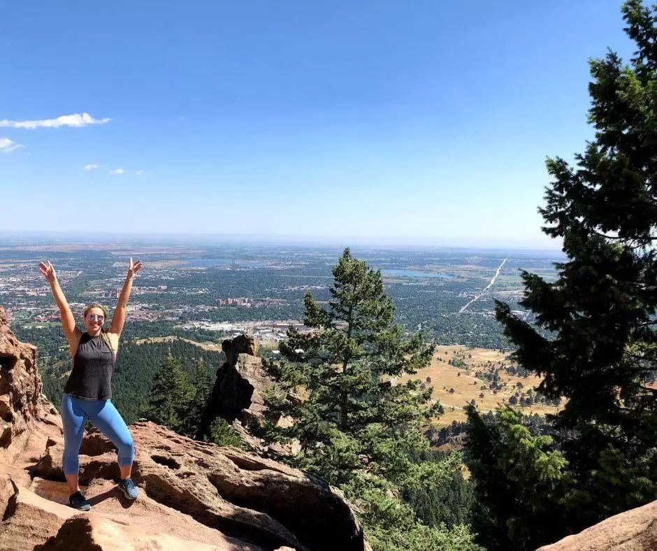 girl having fun on royal arch trail in boulder colorado